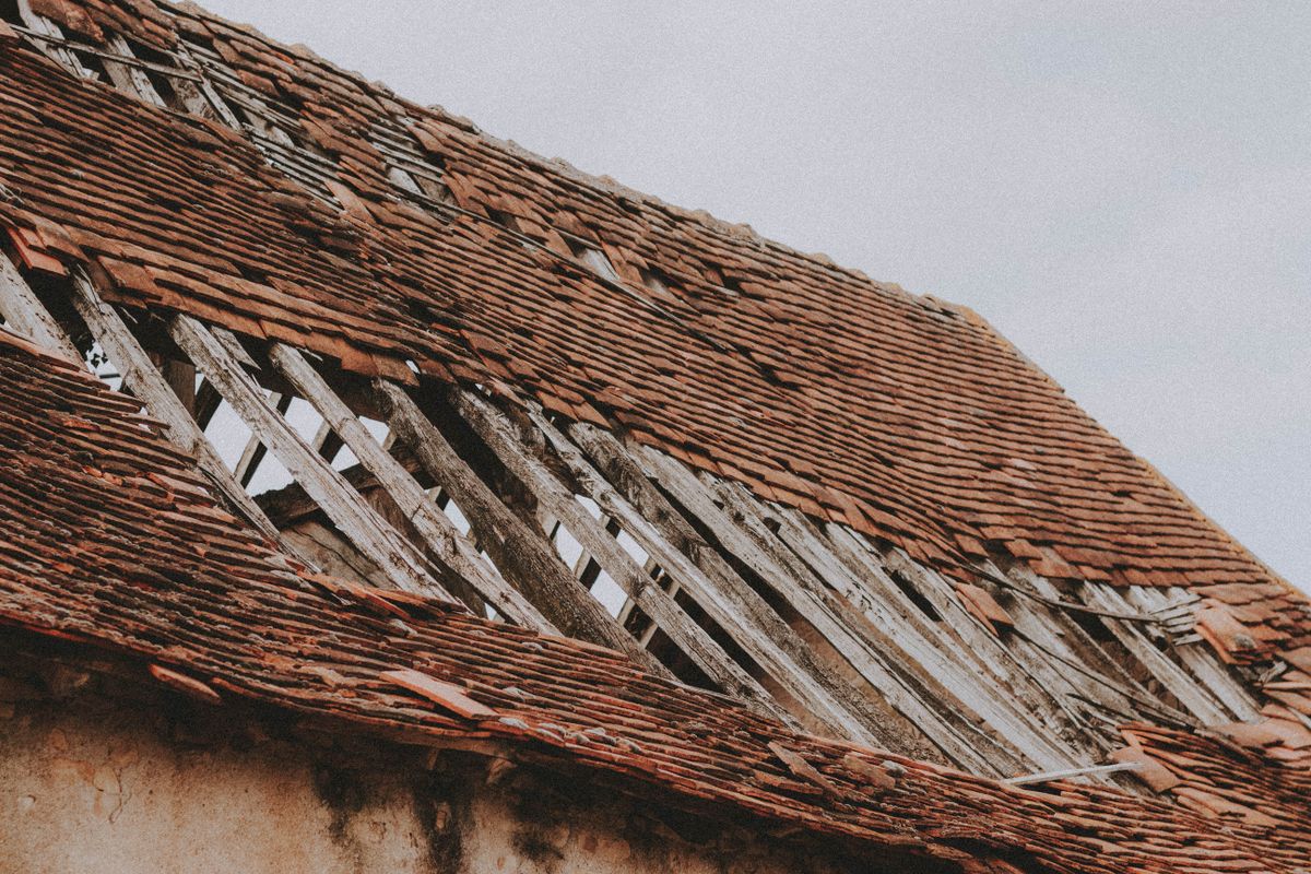 Weathered roof before repair