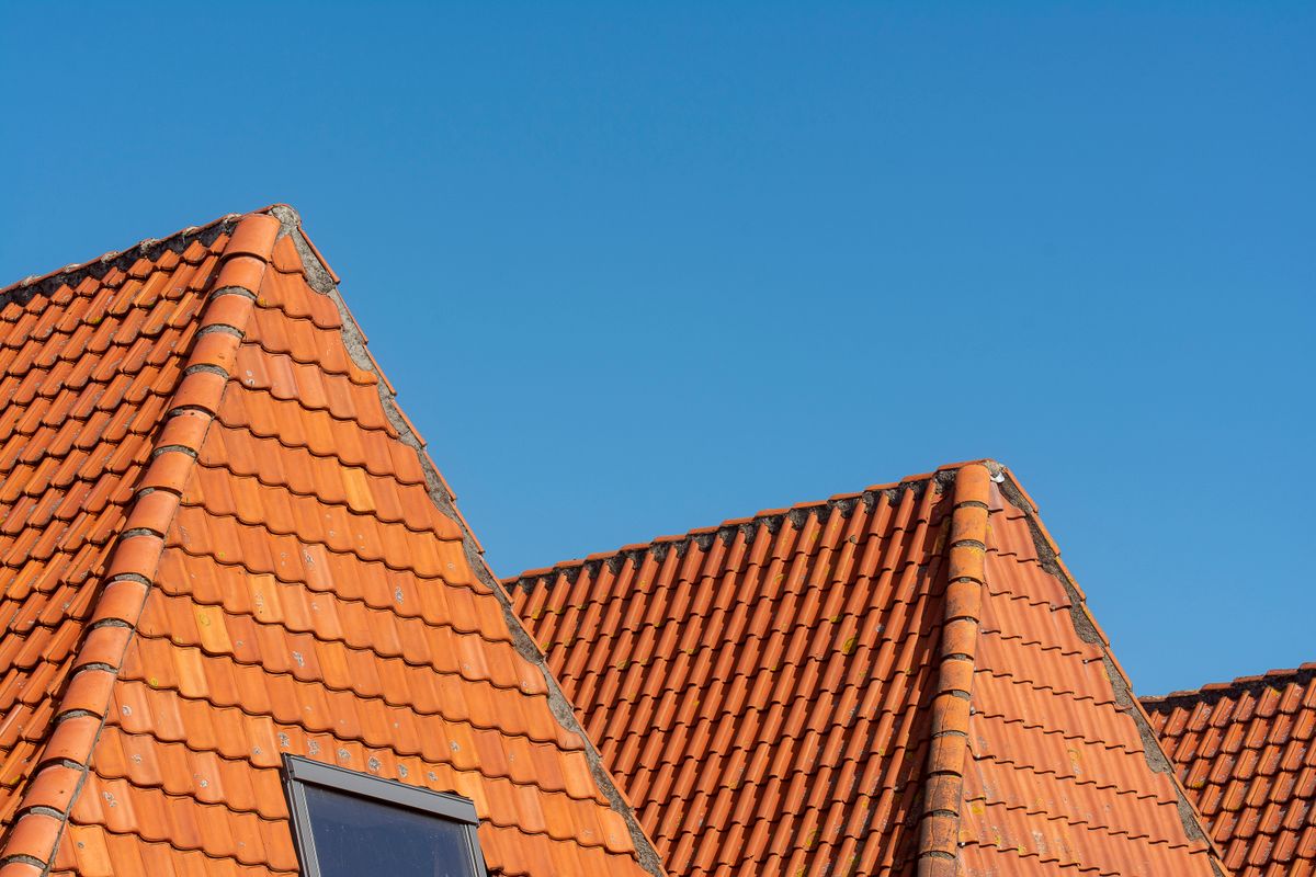 Aerial view of a completed tiled roof project in Belfast